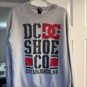 DC Men's Gray Crewneck Sweater with Red and Black Logo